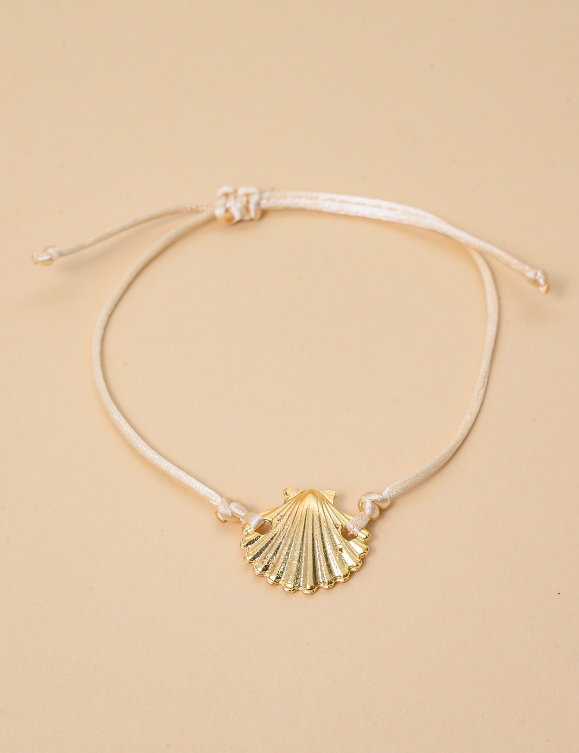 PULSEIRA CORDÃO OFF WHITE PINGENTE CONCHA - PU29069VO17