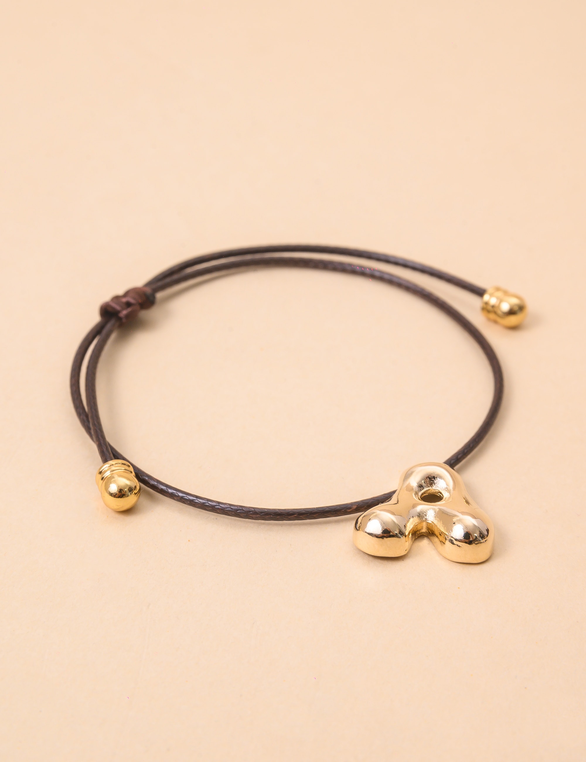PULSEIRA FIO PINGENTE A MARROM - PU29045VO06